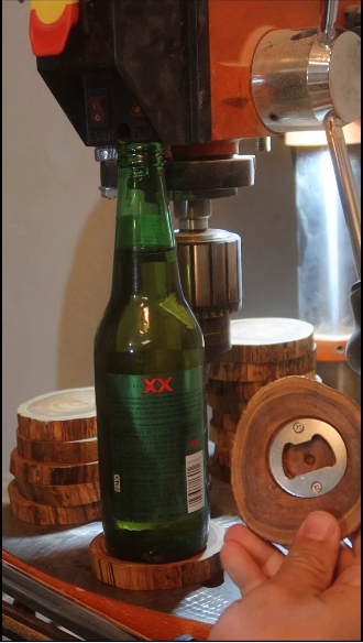 Wood coaster with bottle cap opener