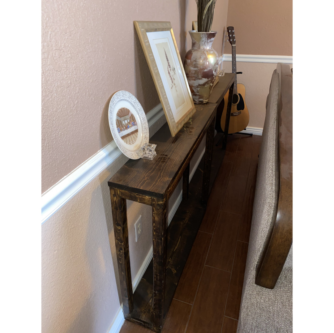 Console table in place behind sofa or couch